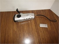 Rechargeable hand crank battery flashlight by
