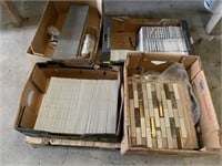 Pallet of assorted tiles various sizes and colors