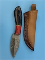 Damascus bladed knife about 8" long leather case,