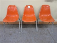 (3) Herman Miller MCM Orange Stackable Chairs
