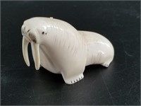 A. Kunayak vintage walrus ivory walrus with tusks,