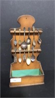 Spoon and fork collection. Dark toned wood
