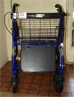 Lot #1233 - Folding walker with seat, brakes