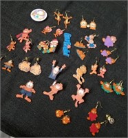 Large group of Garfield earrings and pins with