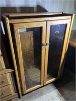 Quaint upright wooden display cabinet