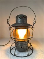 * Railroad Lantern Lighted, CMSTP & PRR, Amber
