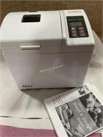Oster breadmaker with cookbook