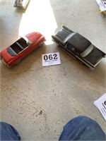 2 vintage cars