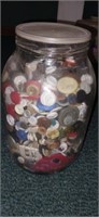 Large jar filled with buttons