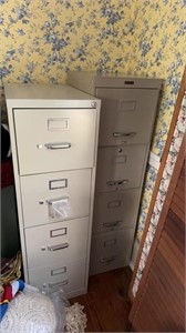 Two metal four drawer, filing cabinets, in the