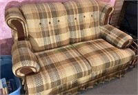 Vintage woven linen loveseat with a checkered