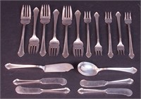 17 pieces of sterling silver flatware,