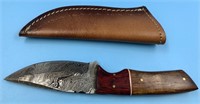 Damascus bladed knife, with wood handle and leathe