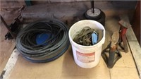 Car Jacks, bucket of chains, fencing wire, hose,