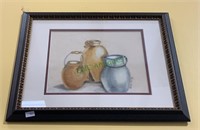Framed watercolor still life of pottery jugs by
