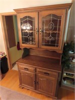 Nice lighted hutch cabinet w/contents.