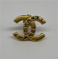 Gold Chanel Pin.