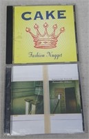 F15) 2 Music CDs Cake & Hootie & The Blowfish
