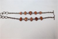 Pair of Stelring Silver goldstone Bracelets