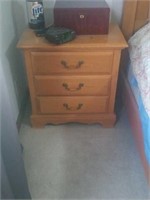 3 drawer wood night stand. In great condition .