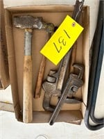 Box of tools: 2 Ridgid pipe wrenches, 3 hammers