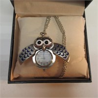 STAINLESS STEEL OWL WATCH ON CHAIN. UNTESTED.