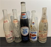 Five Vintage Pepsi Bottles