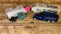 2 COLLECTIBLE TRUCKS, 1 BANK WITH BOXES