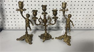 Three Metal Figural Candleholders