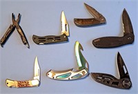 7 ASSORTED POCKET KNIVES & 1 SWISS STYLE TOOL