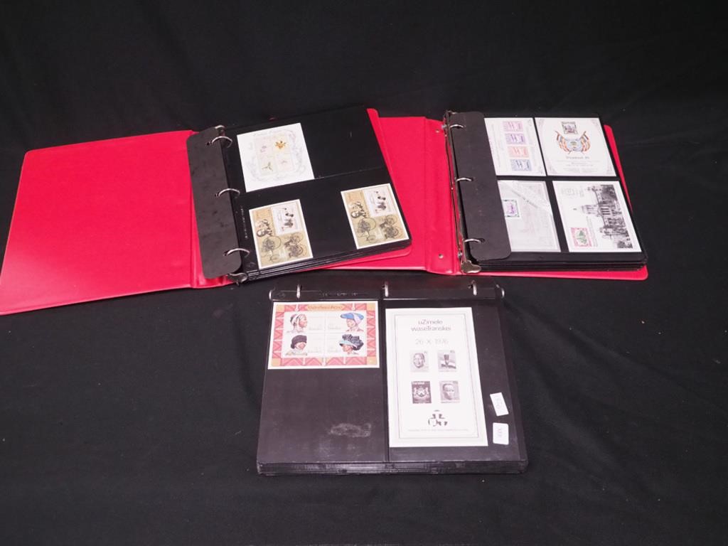 Three binders of foreign mint stamps,