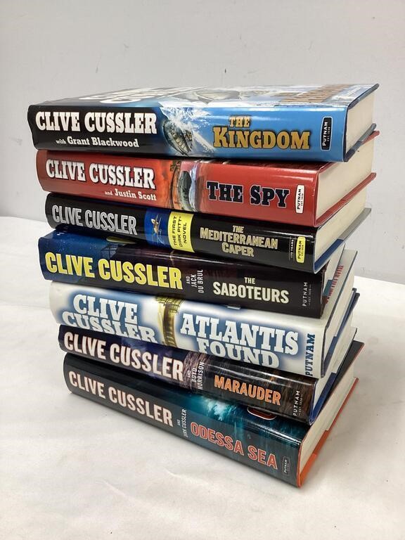 Seven Clive Cussler Books Lot B