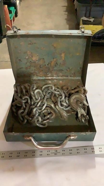 Metal case with chain and vintage pulley