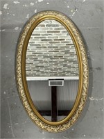 Oval Gold Tone Framed Mirror