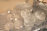 GROUP CLEAR GLASS CRUETS, CUPS, SAUCERS, RELISH