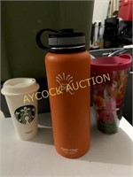Hydro Flask, Tervis (2), and several miscellaneous