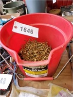 LOT NAILS IN RED BUCKET