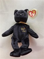 “The End” beanie baby with case, “Decade” beanie
