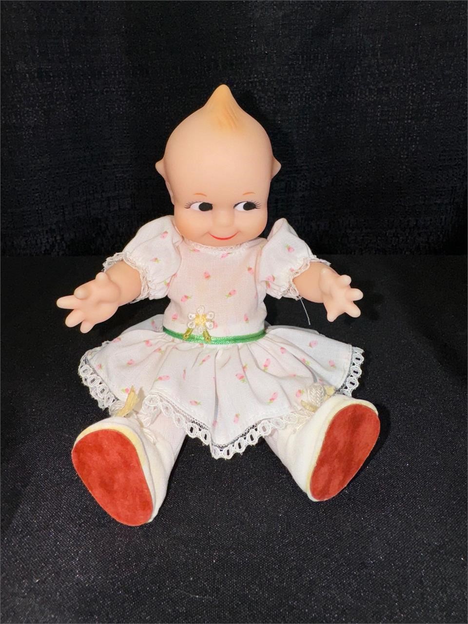 Small Kewpie Doll in white dress