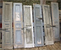 6 antique raised panel wooden shutters,