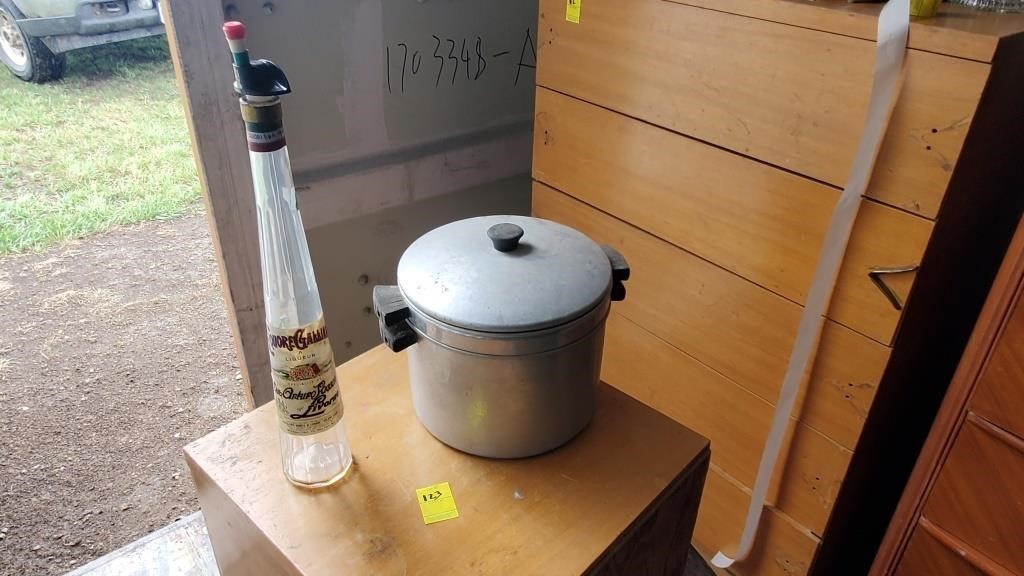 Liquor Bottle & Steamer Pot