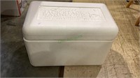 Three Styrofoam coolers - one is large and the