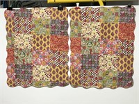 Two quilted patchwork style pillowcase covers