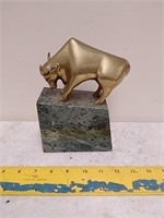 Brass Bull on green marble stand
