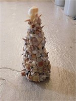 Lighted seashell tree, some shells missing, some