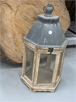 Lantern with glass and latch.