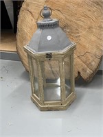 Lantern with glass and latch.
