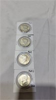 4 silver Kennedy half dollars