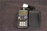 Texas Instruments TI-83 Plus Calculator & Stapler