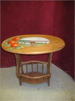 SMALL OVAL TABLE WITH MAGAZINE HOLDER